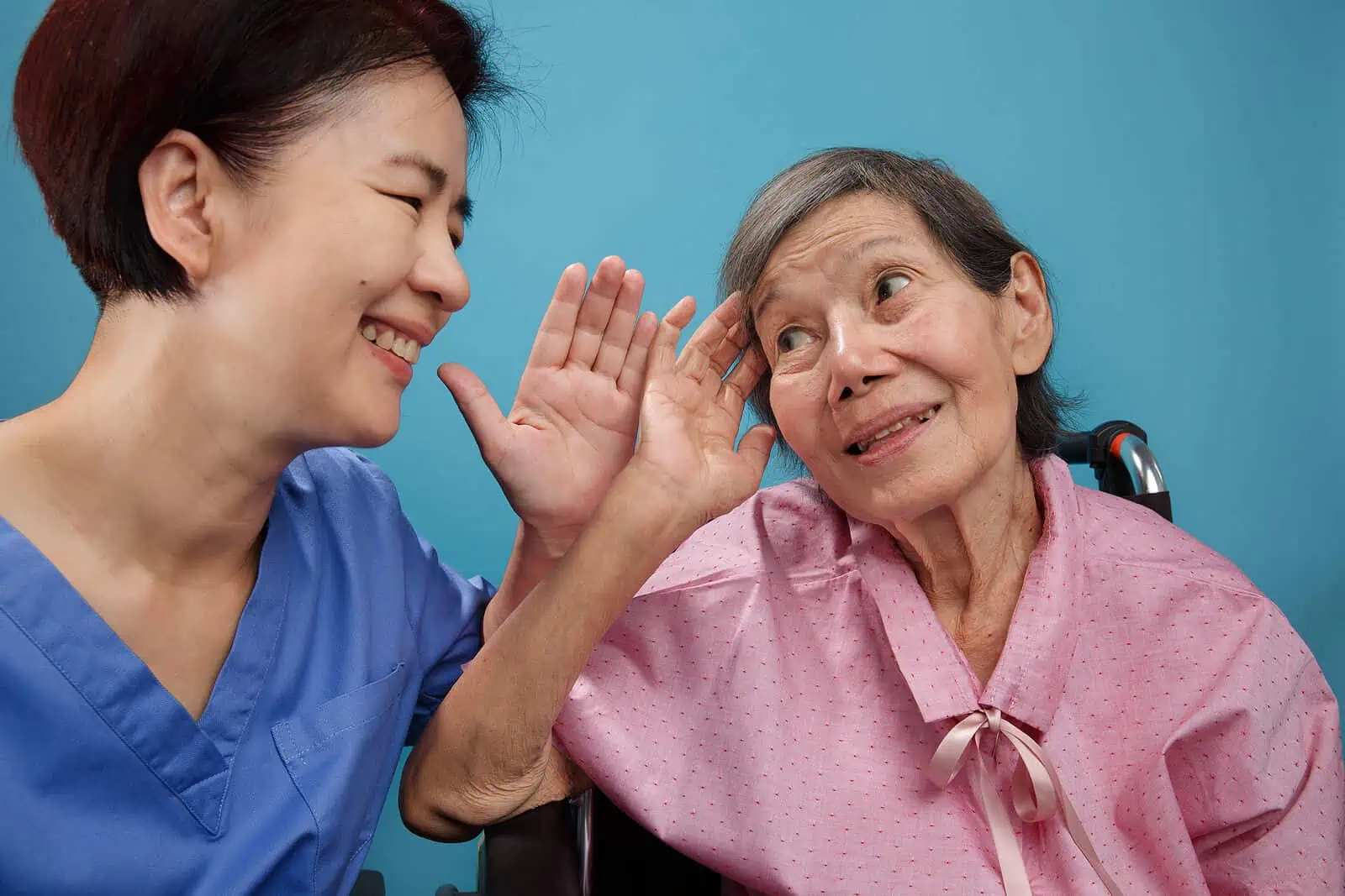 Senior asian woman can hear better with hearing aids